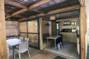 Chalets Lodge avec SPA privatif - Foret et Lac : photos des chambres