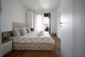 Harizma apartmani - Maja