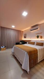 Lindo flat espaçoso e com vista mar - 50m da praia