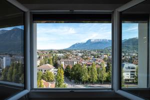 Appartements SKY, appartement avec vue imprenable sur Annecy et place de parking : photos des chambres