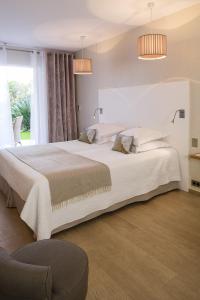 Hotels Hotel des Lices : photos des chambres