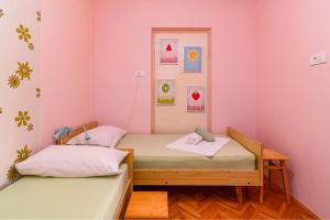 Apartments and rooms by the sea Banjol, Rab - 5077