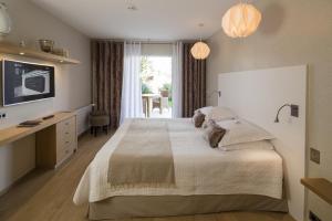 Hotels Hotel des Lices : photos des chambres