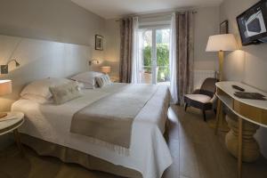 Hotels Hotel des Lices : photos des chambres