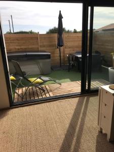 Maisons de vacances Au 29 logement cocon avec jacuzzi privatif : photos des chambres