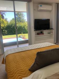 Casa en Vistalba para dos personas con yacuzzi de temporada en la terraza