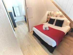 Appartements L'Etoile by MRODBNB - Appart Neuf - Vue Mer - 25m Plage & Resto - Cine - cheminee - Popcorn : photos des chambres