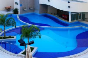 Atrium Flat, frente shopping Singapura