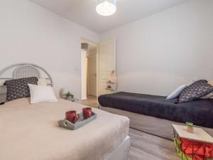 Appartements Appartement 6 pers, centre St-Lary, 2 ch + cabine, garage, balcon, et ascenseur - FR-1-296-361 : photos des chambres