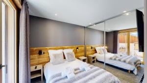 Chalets Nouveau ! Chalet pied des pistes : photos des chambres