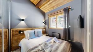 Chalets Nouveau ! Chalet pied des pistes : photos des chambres