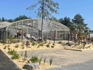 Chalets Cottage dans Parc Residentiel de Loisirs, Piscine, 150M de la mer : photos des chambres