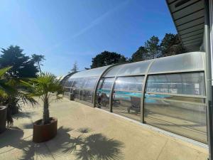Chalets Cottage dans Parc Residentiel de Loisirs, Piscine, 150M de la mer : photos des chambres