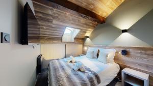 Chalets Nouveau ! Chalet pied des pistes : photos des chambres
