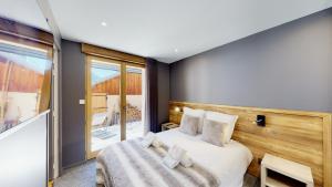 Chalets Nouveau ! Chalet pied des pistes : photos des chambres