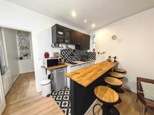 Appartements 3 Pieces a Saint-Ouen (Metro 13/14) : photos des chambres