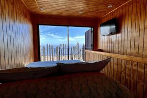 Tiny Cabin In The Rocks