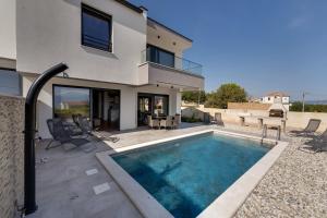 Villa Rosemary -semi-detached villa with a pool and a panoramic view, close to a sandy beach - by TRAVELER tourist agency Krk