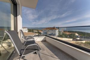 Villa Rosemary -semi-detached villa with a pool and a panoramic view, close to a sandy beach - by TRAVELER tourist agency Krk