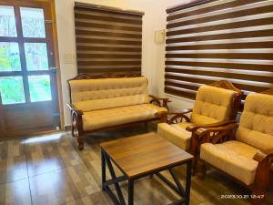 Family Cottage at Merlys Fruit Garden, Thattekkad