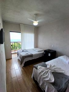 Suíte 03 com Varanda - Avenida Hospedagem