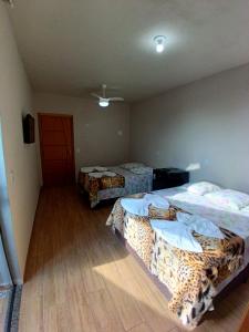 Suite 04 - Avenida Hospedagem