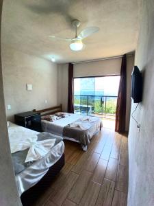 suite 01 com Varanda -Avenida Hospedagem