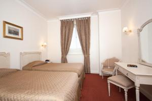 Hotels Grand Hotel Moderne : photos des chambres