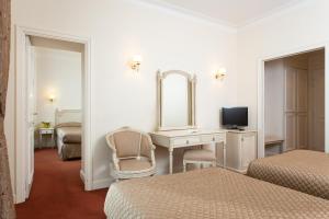 Hotels Grand Hotel Moderne : photos des chambres
