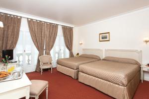 Hotels Grand Hotel Moderne : photos des chambres