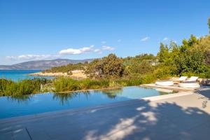 Villa Iris - Luxury traditional beachfront villa with swimming pool