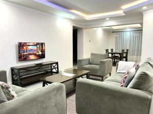 Midtown Executive Suites With Balcony, King Bed and Swimming Pool