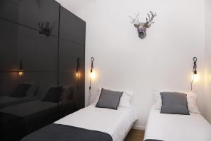 Appartements Appartement Paris by La Boite En Plus : photos des chambres