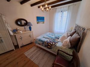Maisons de vacances Le Cottage de Sainte Valiere (Jacuzzi et terrasse ) : photos des chambres