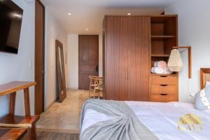 NHOA 101B Lux 1BR Condo Pool access in Aldea Zama