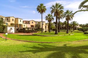 Apartments in residence with swimming pool in Santa Margherita di Pula, 250 meters from the sea