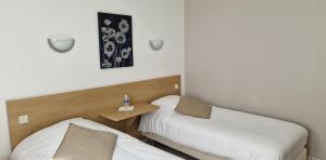 Hotels Hotel Du Commerce : photos des chambres