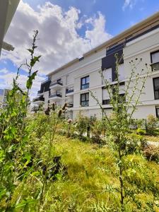 Appartements l'Eden familial - cosy T3 proche Disneyland avec jardin : photos des chambres