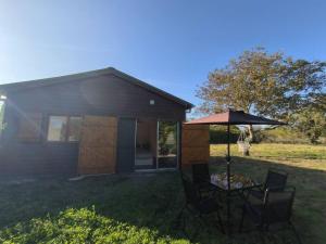 Chalets Chalet avec grand jardin Lit avec balancoire atypique : photos des chambres