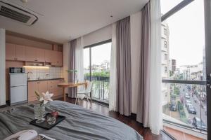 Express by M Village Thạch Thị Thanh