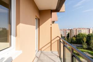 Osiedle Kombatantów Standard Apartment by BookingHost