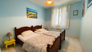 Villas Villa individuelle de plain pied, a 300m du marche, et 500m de la plage, : photos des chambres