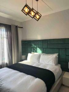 Cosy apt 10min to OR Tambo