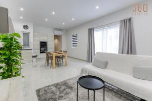 A lovely 1BR home with Balcony just off the coast by 360 Estates