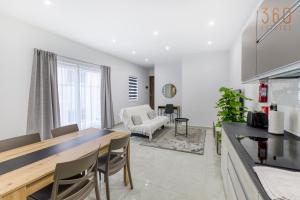 A lovely 1BR home with Balcony just off the coast by 360 Estates