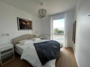 Appartements Magnifique appartement T4 : photos des chambres