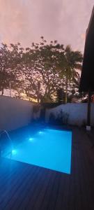 Linda casa com piscina 100 metros da praia