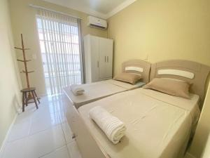 107- Apartamento c patio e piscina privada Bombas