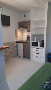 Appartements Studio cosy en rez-de-chaussee : photos des chambres