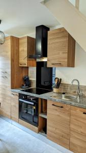 Maisons de vacances L'echoppe d'Elise (Gite neuf) : photos des chambres
